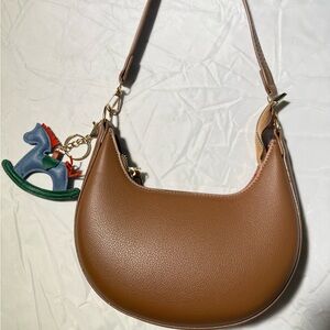 Elegant Tan Women's Shoulder Bag with Horse Charm